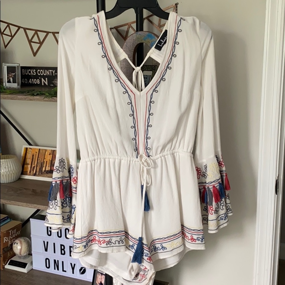 Bell sleeve white tassel romper from LuLus
